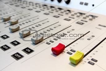 Sound mixer, low angle shot with shallow DOF, useful for various music and sound themes