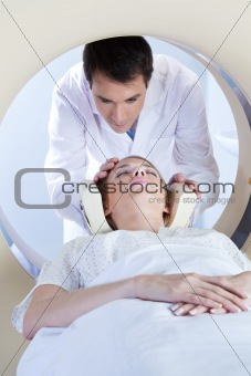 Woman going through MRI scan