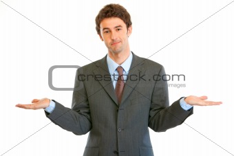 Young businessman with surprise expression on his face
