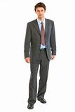 Full length portrait of concentrated businessman making first step
