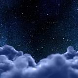 space or night sky through clouds