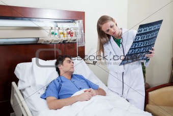 Doctor showing report to the patient