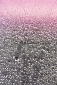 Water Droplets on Glass with Purple Gradient