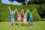 Happy Teenage Girls with Outstretched Arms