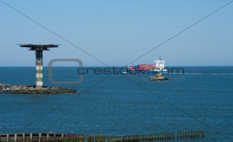container ship leaving rotterdam