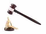 Judges gavel and wooden mannequin