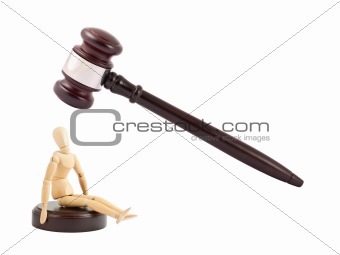 Judges gavel and wooden mannequin