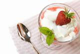 Dessert with cream and strawberries