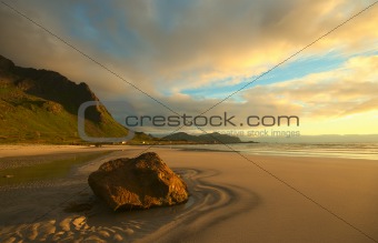 Rock on Beach Lit by the Norwegian Midnight Sun