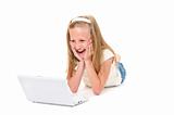 Happy little girl with laptop