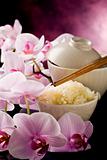 Asian rice dish with orchid flowers