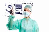nurse in surgery dress on touch screen