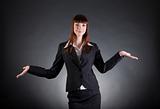 Cheerful business woman showing open hands 