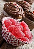 Red heart jelly sweets and chocolate cupcakes