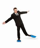 man in a business suit and flippers for swimming