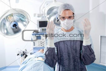 Portrait of male surgeon in operation theatre