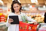 Woman with Tablet PC Shopping List
