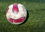Used Football ball on the field