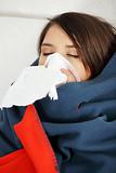 Young woman at home having flu.