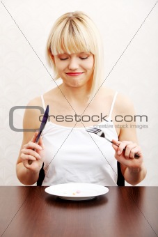 Woman eating nutritional supplement