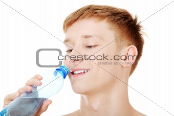 Young male drinking water 