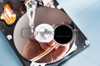Doctor inspecting bad hdd