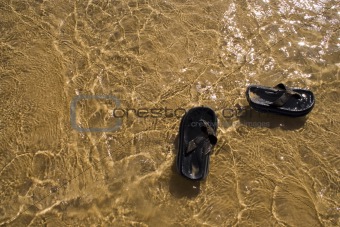 sandals in the water