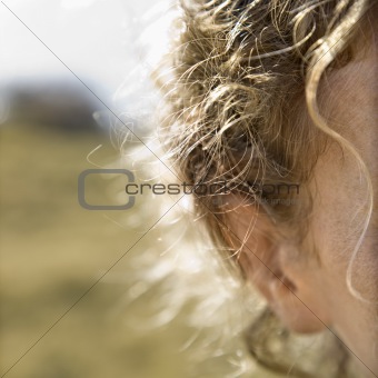 Woman with wavy hair.
