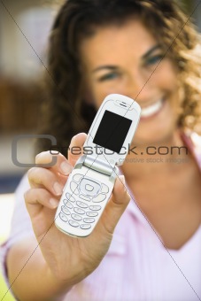 Female holding phone.