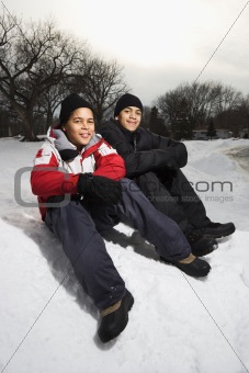 Boys smiling in snow.