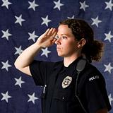 Policewoman saluting.