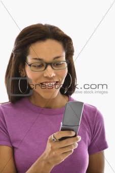 Woman using cell phone.