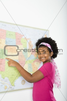 Schoolgirl with map.