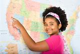 Girl pointing to map.