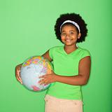 Girl holding globe.