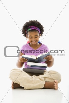 Girl reading books.