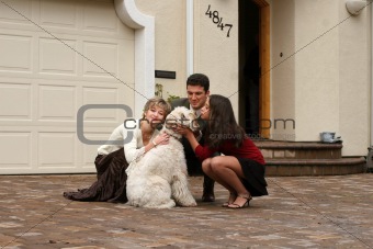 Happy family with a dog