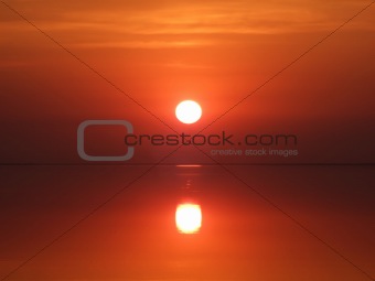 Red sunset above a serene gulf