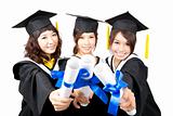 three graduation asian girls holding their diploma