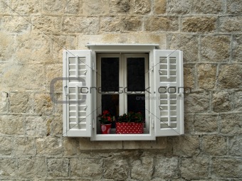 Window on stone wall