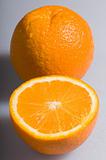 juicy orange is on a gray background