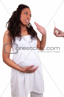 pregnant black woman refusing a cigarette
