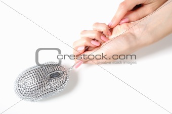 Beautiful hand with perfect manicure and glamour computer mouse 