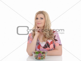beautiful woman eating green vegetable salad. isolated on white 