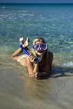 Young happy beautiful summer woman with swimming mask and snorkel