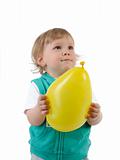 Cute little child smiling and holding a baloon. isolated