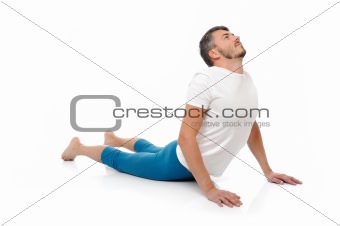 young man practicing yoga postures combination cobra. isolated
