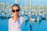 Portrait of a girl in the background of yachts