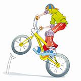 boy practicing bike pirouettes