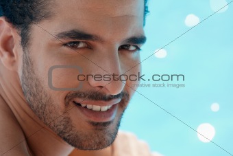 young man sitting in swimming pool